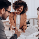 couple getting a loan from a bank officer